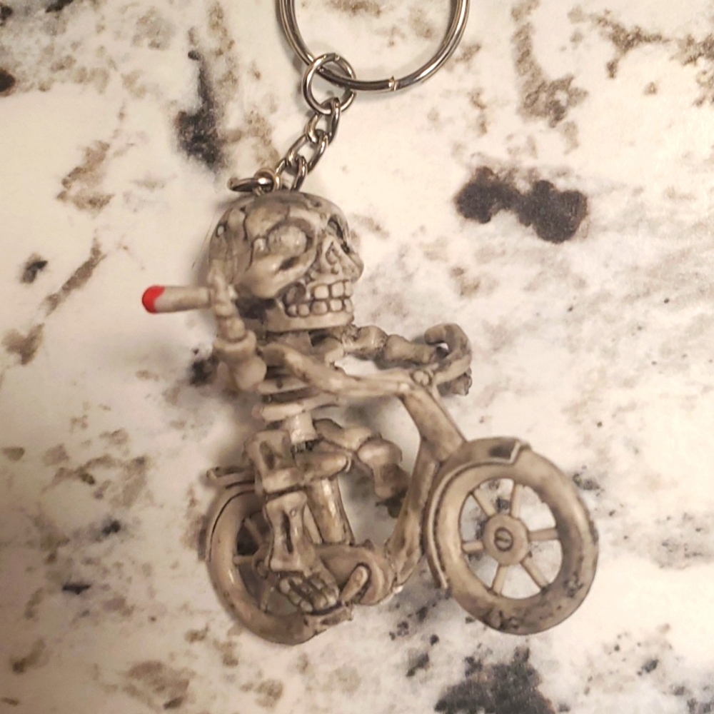 3D Smoking Skeleton on a Bike Hard Rubber Key Ring.
